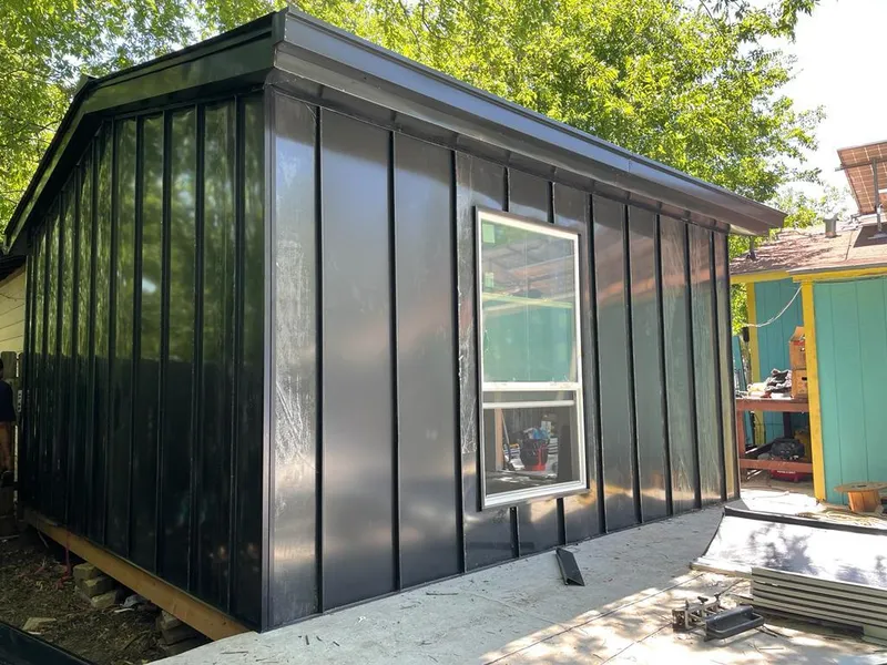 Black standing seam metal wall panels for Metal Roof Installation in McFarland