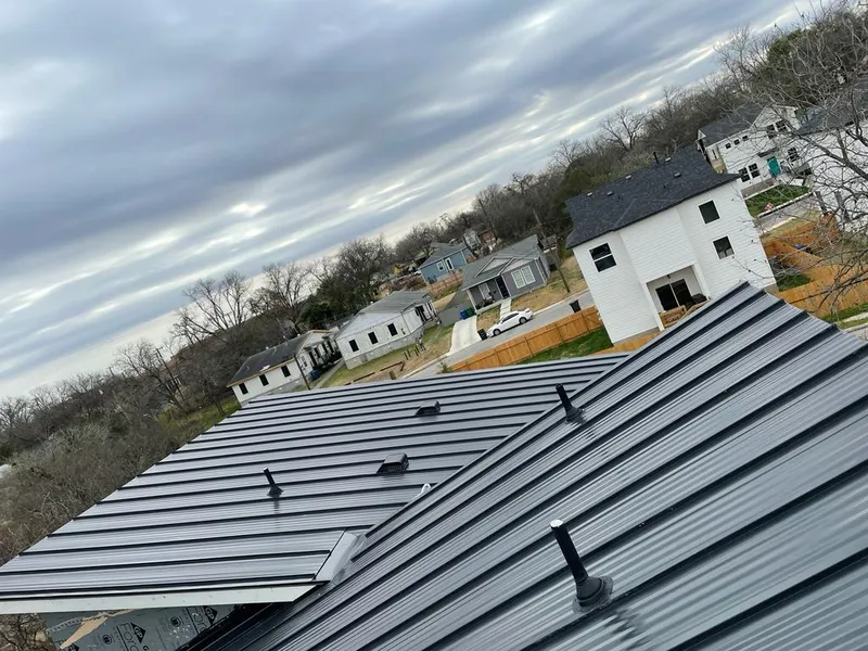 Standing seam metal roof panels with vents for Skylight Repair in McFarland